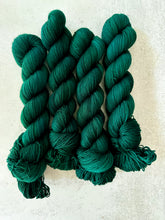 Load image into Gallery viewer, Torn Green Velvet Eyes BFL Sock Yarn