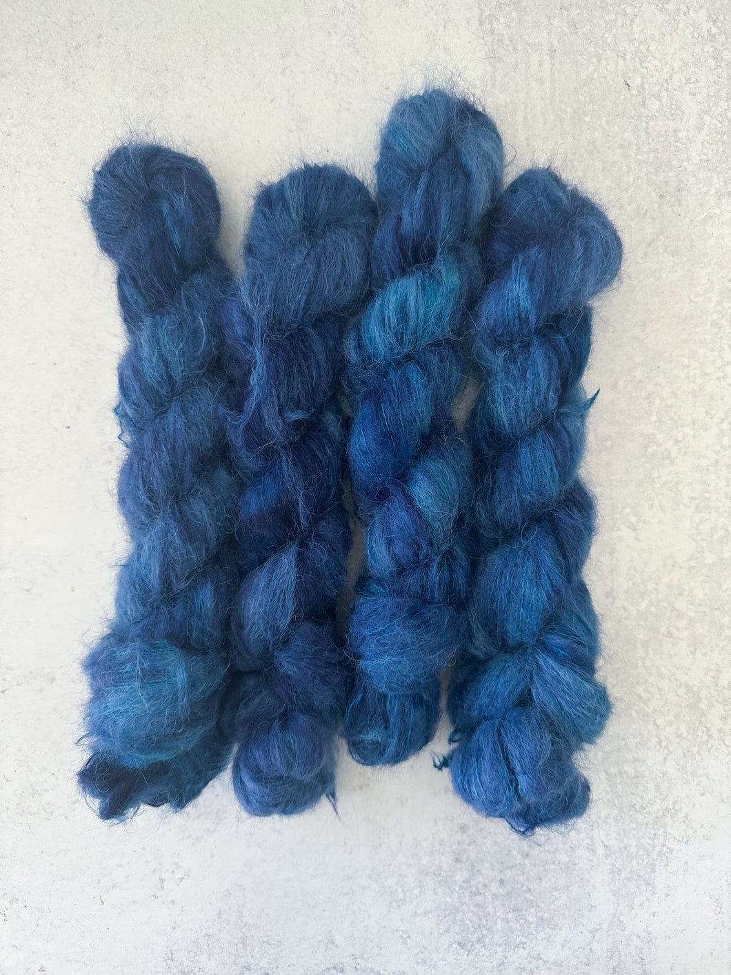 Revolution in the Air Suri Silk Floof