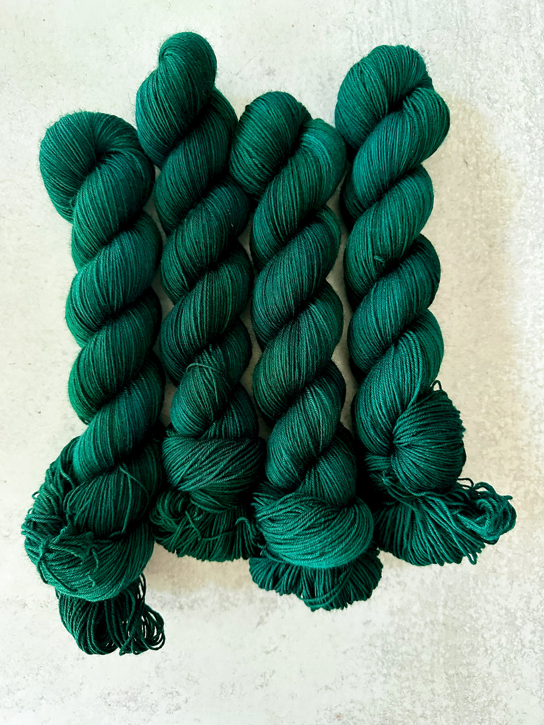 Torn Green Velvet Eyes BFL DK Yarn